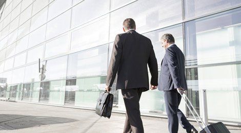 2 people arriving at the airport