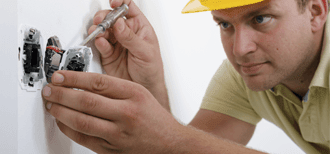 Man Repairing Electrical Socket Man Repairing Electrical Socket