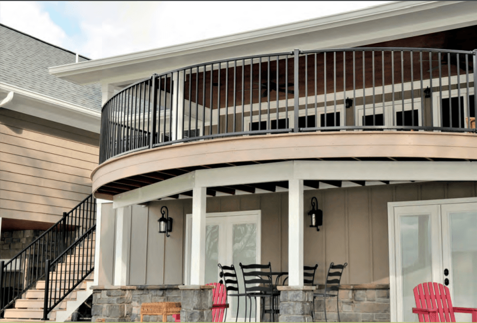 A house with a curved deck and stairs