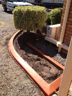 curved red kerb