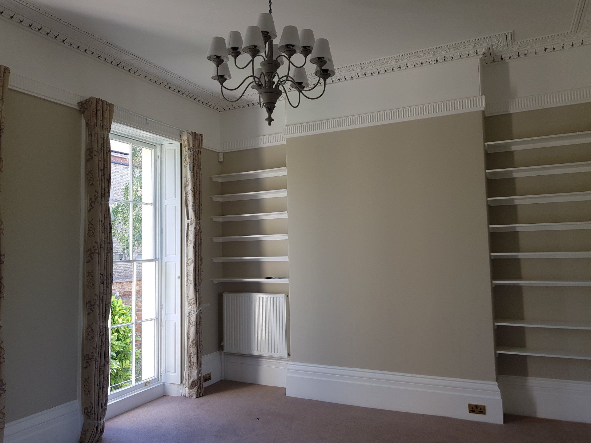 Completely redecorated flat in Cheltenham with decorative coving
