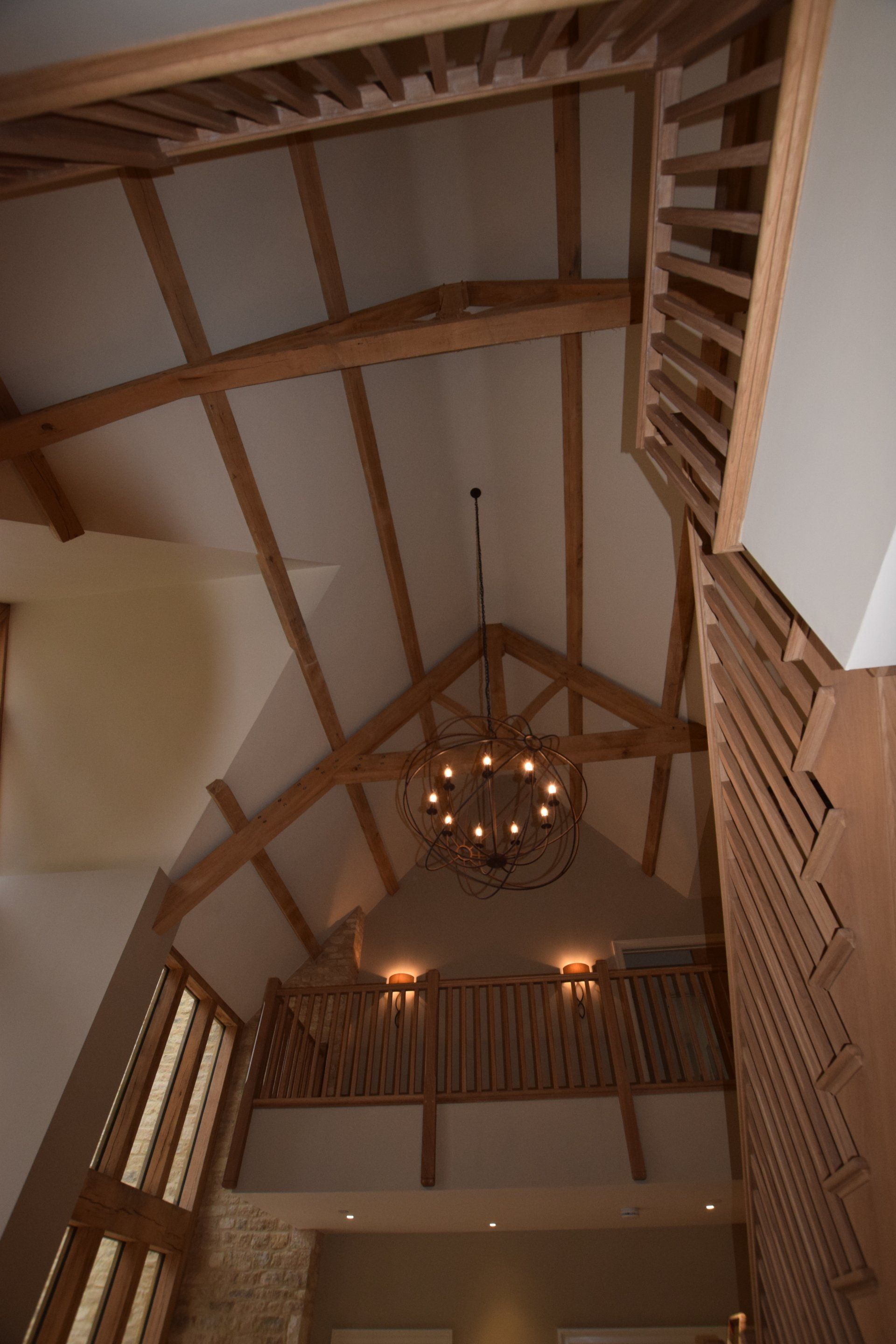 Internal decoration to large entrance hall in Cheltenham , oak beams finished in Osmo Oil