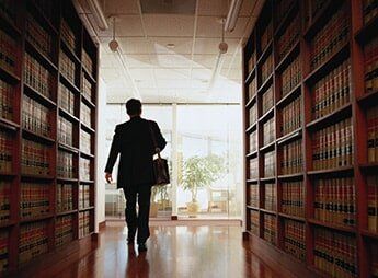 Man walking inside the law office — Lawyers Terre Haute, IN Man walking inside the law office — Lawyers Terre Haute, IN