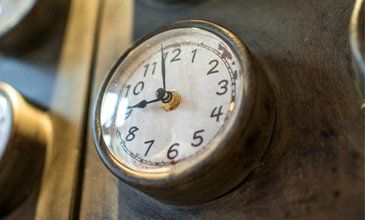 Grandfather Clocks — Metal Wall with Old Styled Clocks in Madison, WI Grandfather Clocks — Metal Wall with Old Styled Clocks in Madison, WI
