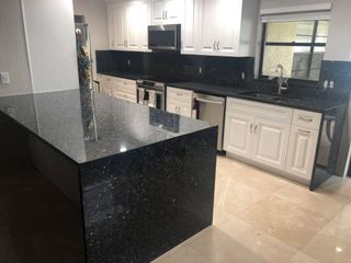 Dark Marble Countertop and Walls — Palm Harbor, FL — Tarpon Marble, Inc. Dark Marble Countertop and Walls — Palm Harbor, FL — Tarpon Marble, Inc.