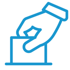 A hand is putting a ballot in a ballot box.