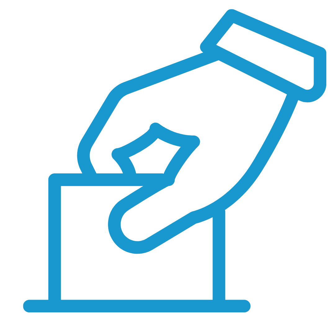 A hand is putting a ballot in a ballot box.