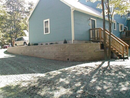 Blue house landscaping in North Attleboro, MA