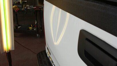 White Car Before — Dent Repair in Garden City, KS
