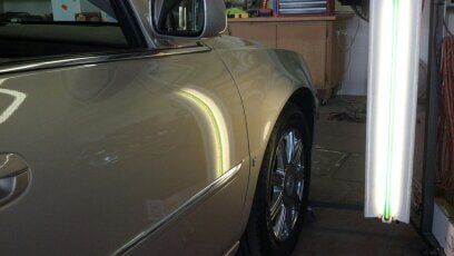 Cadillac Dent After — Dent Repair in Garden City, KS