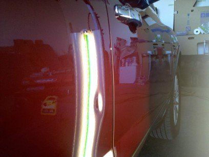 Red Car Before — Dent Repair in Garden City, KS