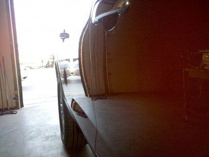 Red Car After — Dent Repair in Garden City, KS