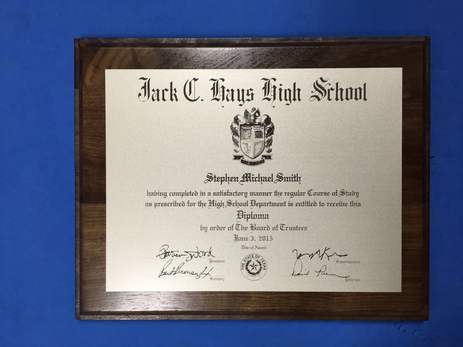 Custom diploma etched in metal on plaque