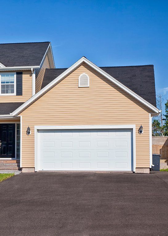 Parking Lot Asphalt Paving Service — Residential Asphalt Driveway in Omaha, NE Parking Lot Asphalt Paving Service — Residential Asphalt Driveway in Omaha, NE