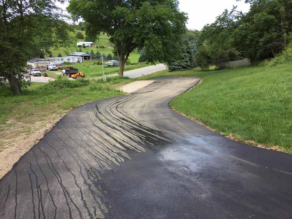 Driveway Repairs — Photo of Asphalted Road in Omaha, NE