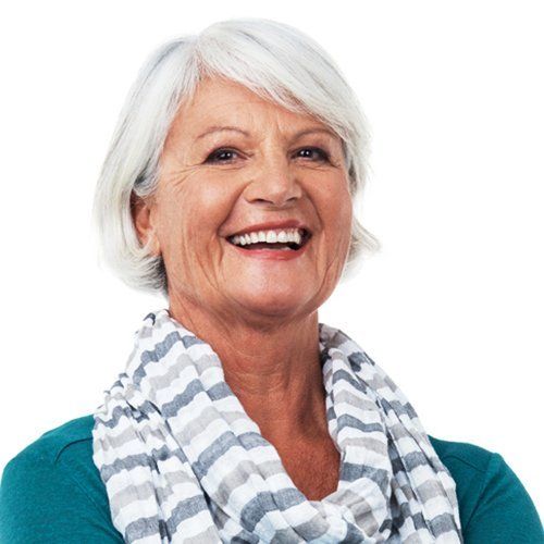 older woman using complete denture replacements