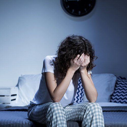 woman suffering from sleep apnea