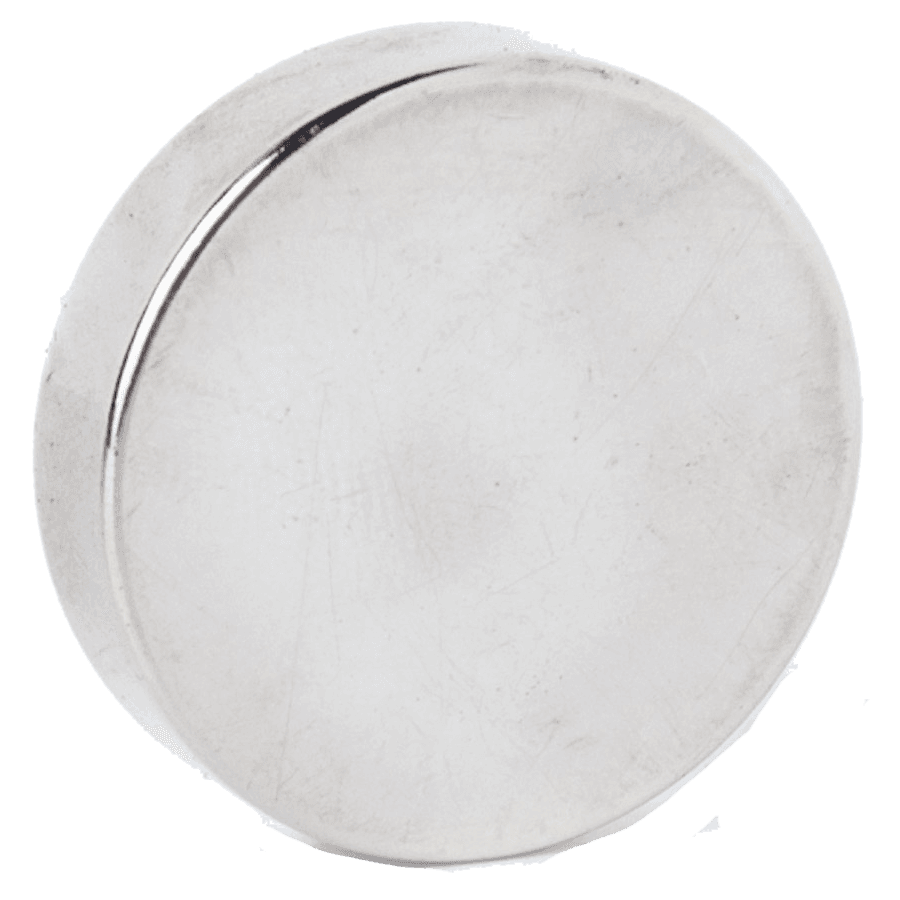 A close up of a round metal object on a white background.