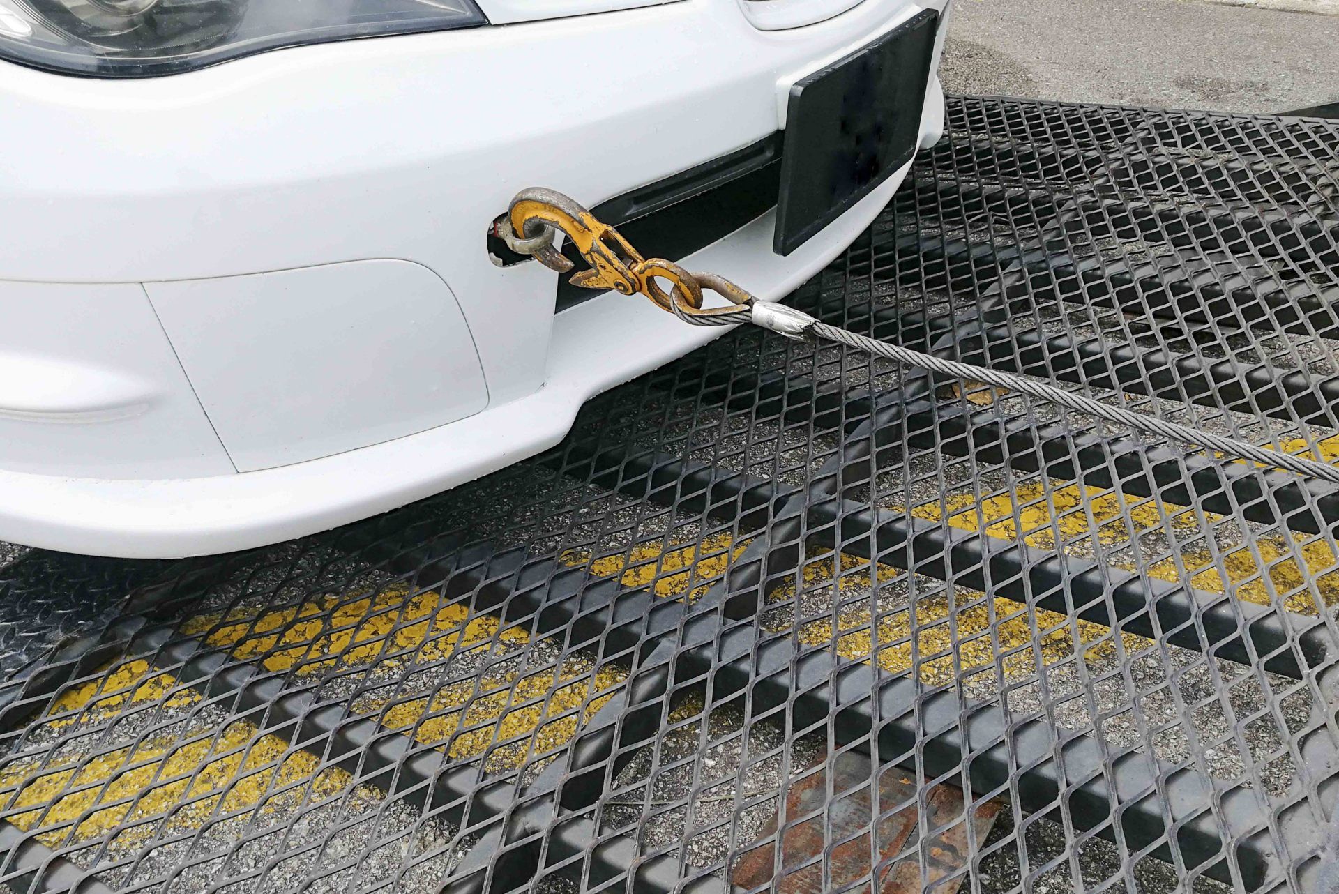 Towing — Car Towed Onto Flatbed Tow Truck in Akron, OH