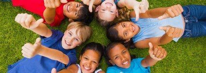 Happy Children on Ground — School & Sport Physicals in Waterboro, ME. Happy Children on Ground — School & Sport Physicals in Waterboro, ME.