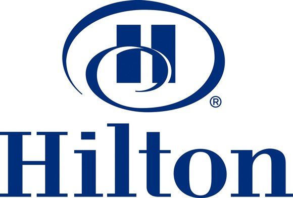 A blue hilton logo on a white background