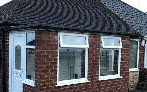 a beautiful conservatory with tiled roof
