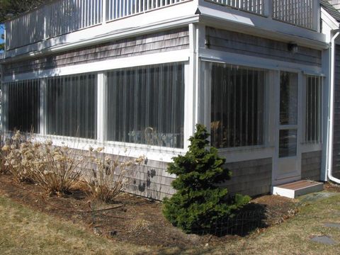 Storm Protection — House with Bricks and Roll Shutters Storm Protection — House with Bricks and Roll Shutters