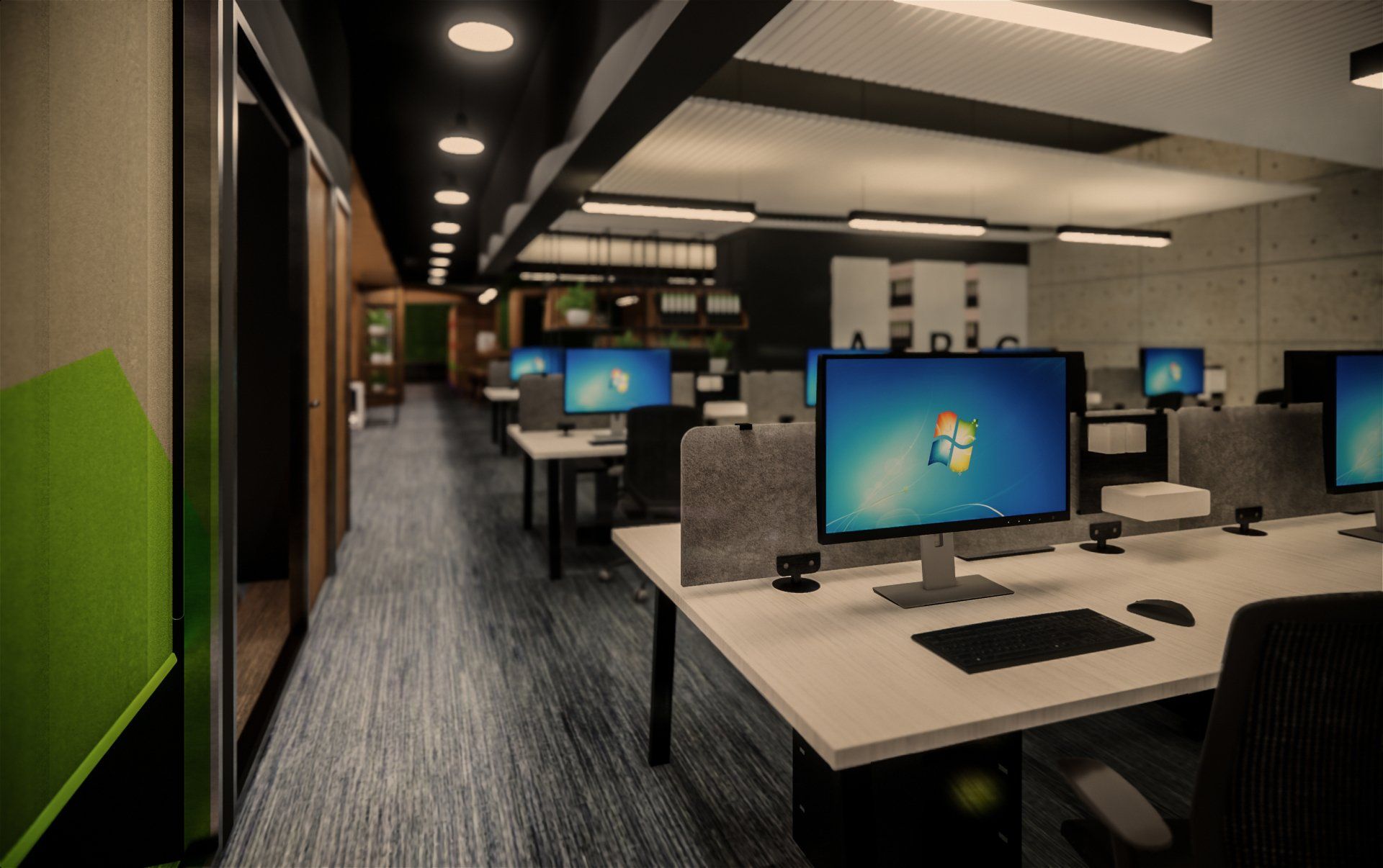 Una oficina con muchas computadoras en los escritorios.