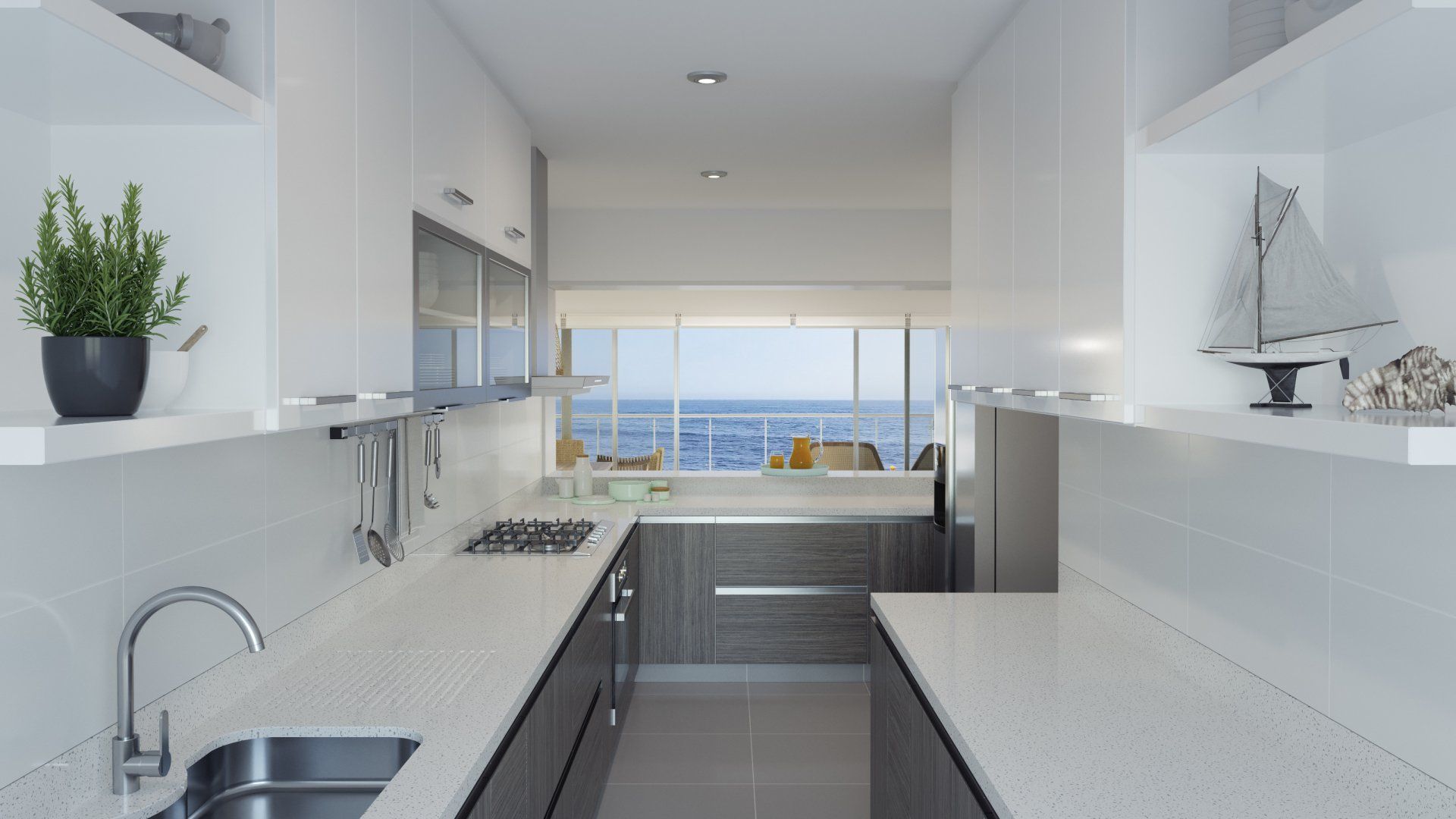 Una cocina con fregadero, estufa y ventana con vista al océano.