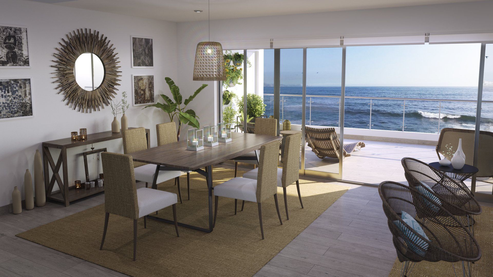 Un comedor con mesa y sillas y vista al mar.