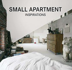 Un pequeño apartamento con cama, cómoda, chimenea y estatua.