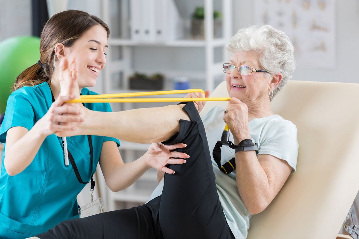 Nurse and senior woman in rehabilitation services