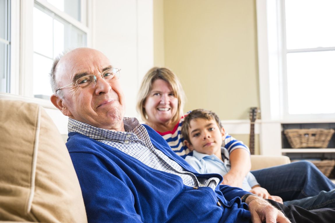 Senior man with visitors