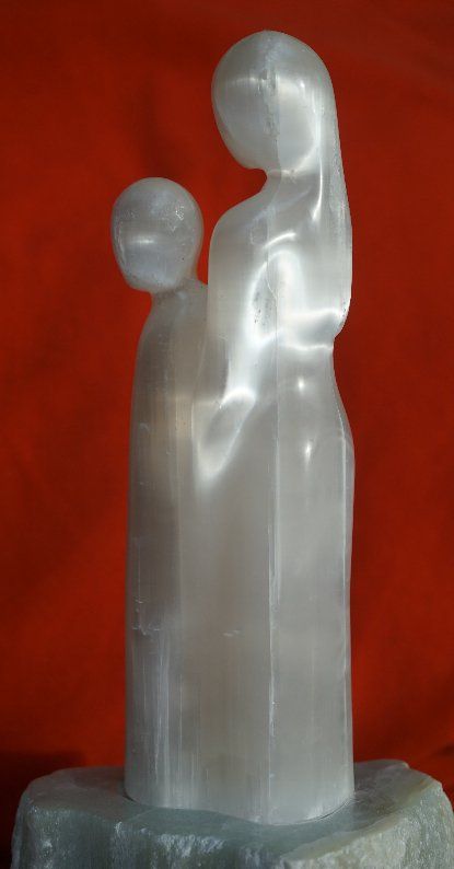 foster mother and child; selenite sculpture by Gera ter Meulen