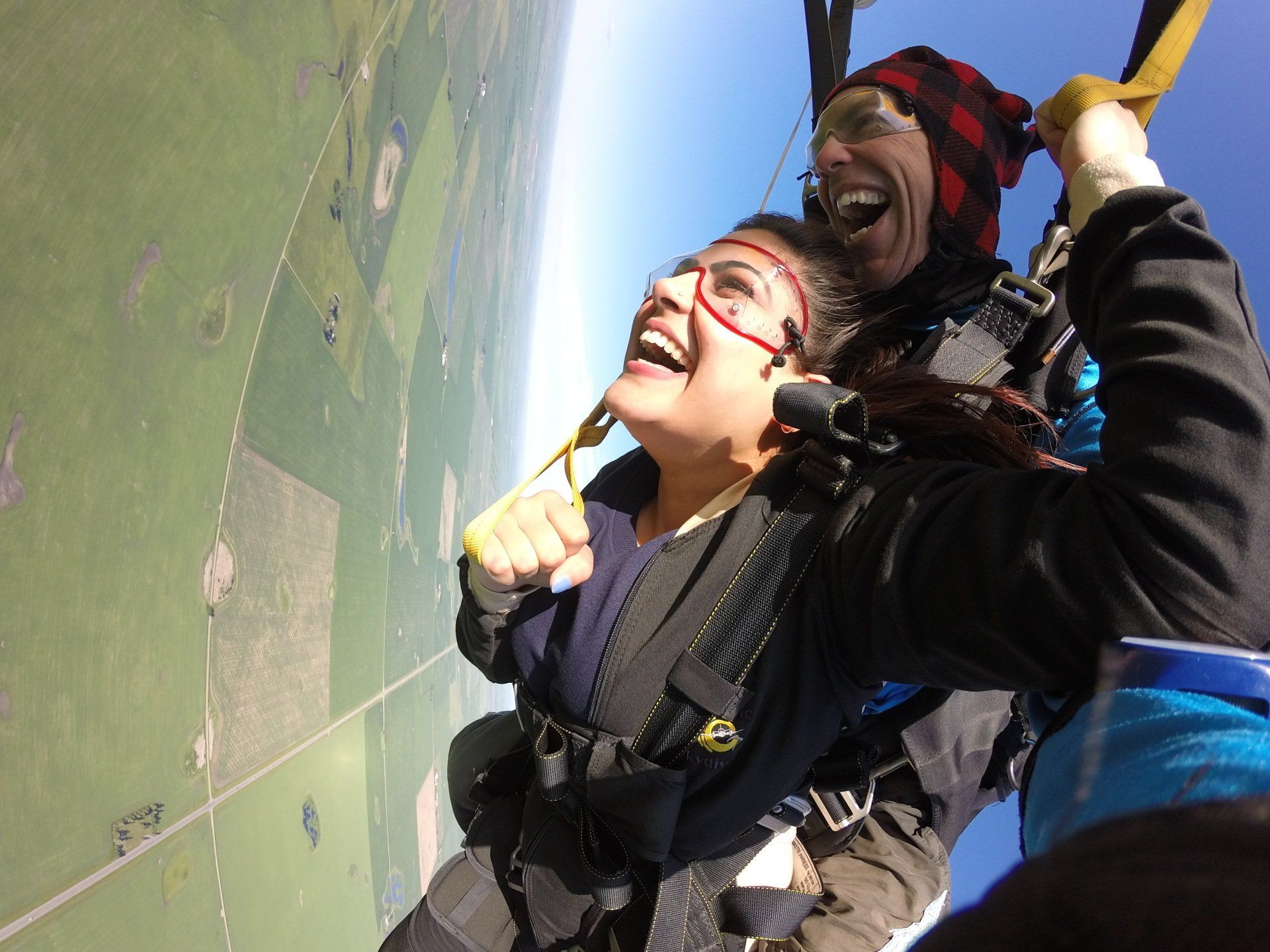 A man and a woman are flying through the air
