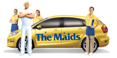 The Maids cleaning service logo on a yellow car with four staff members in yellow uniforms