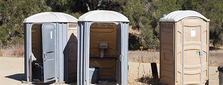 Several Portable Toilets