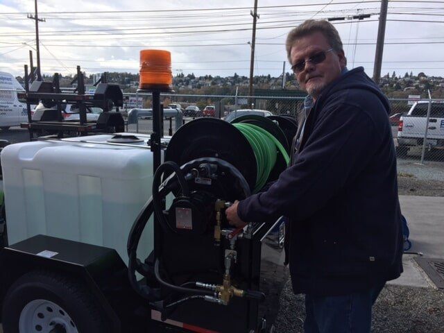 Plumber with equipment - Drain Cleaning in Swansboro, NC
