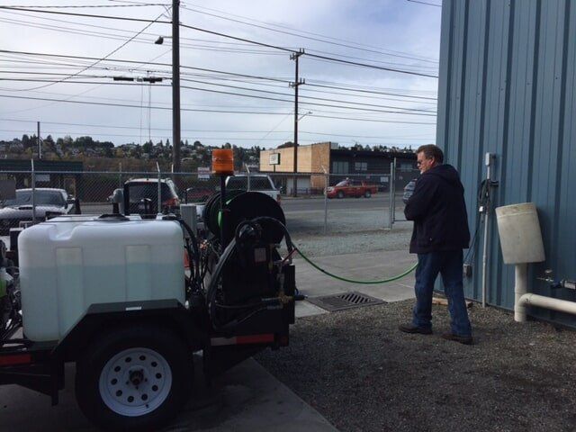 Plumber preparing for cleaning - Clogged Drain in Swansboro, NC Plumber preparing for cleaning - Clogged Drain in Swansboro, NC