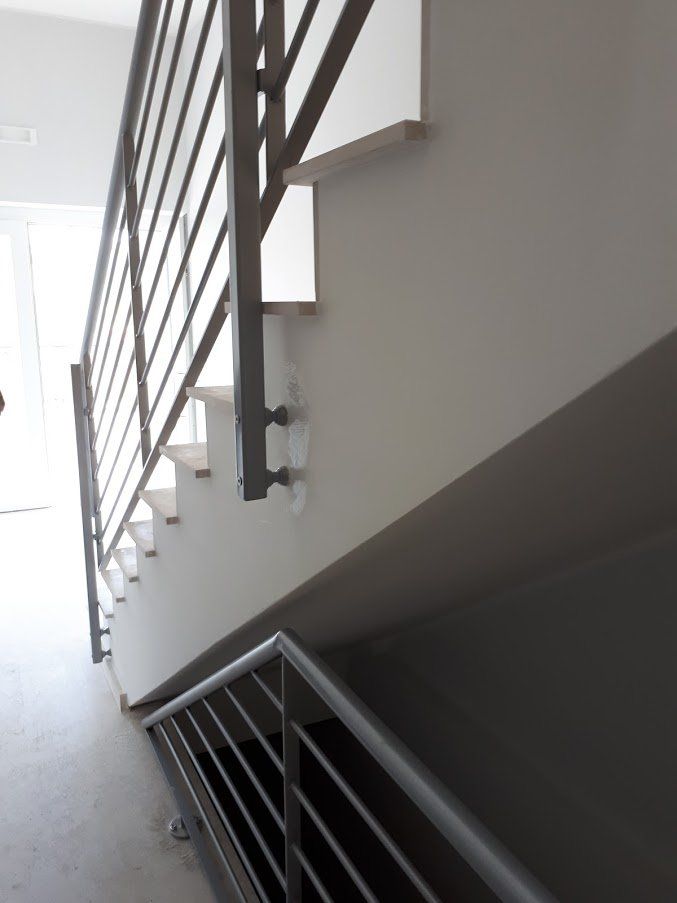 Scala con parapetto