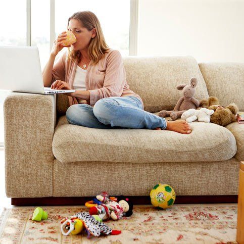 woman sitting on couch