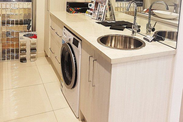laundry room cupboards and washer
