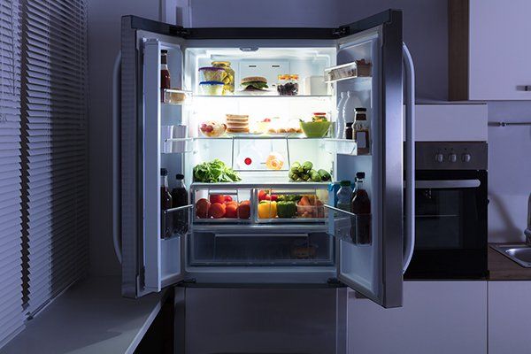Open Refrigerator in Kitchen — Cape Cod, MA — Cape Appliance Repairs Open Refrigerator in Kitchen — Cape Cod, MA — Cape Appliance Repairs