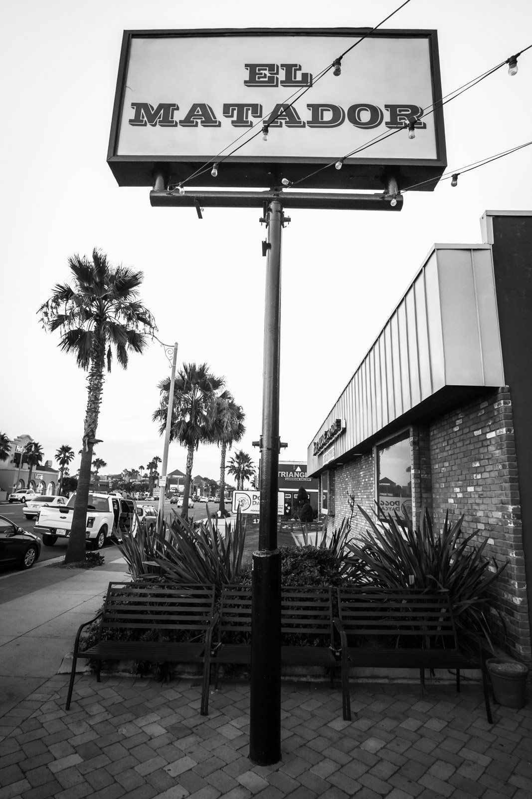 Image of el matador restaurant sign. Interior design of the restaurant was done by ivy glore.