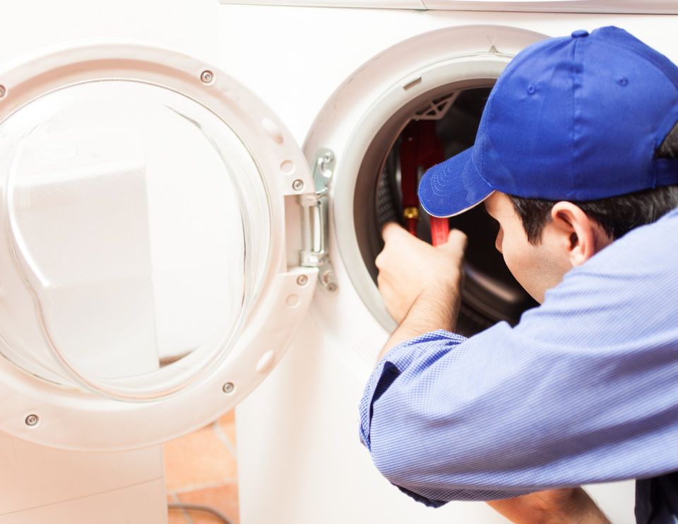 Appliance Repair — Man Repairing Coffee Maker in Dallas, TX