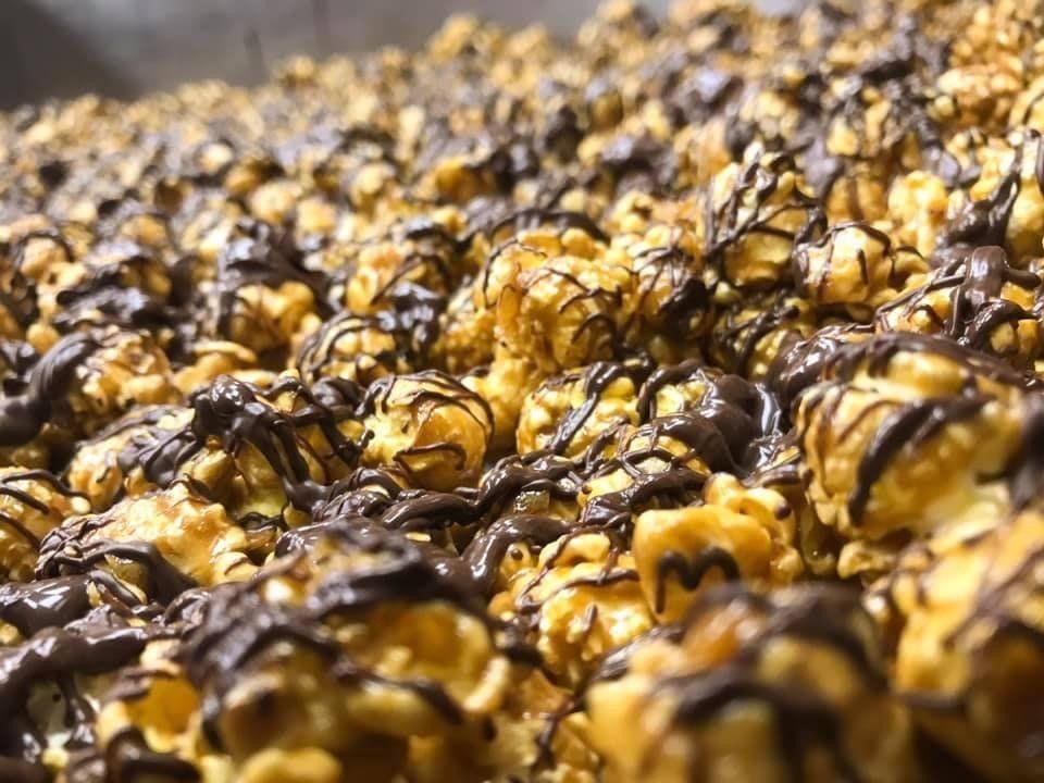 A close up of a pile of chocolate covered popcorn.
