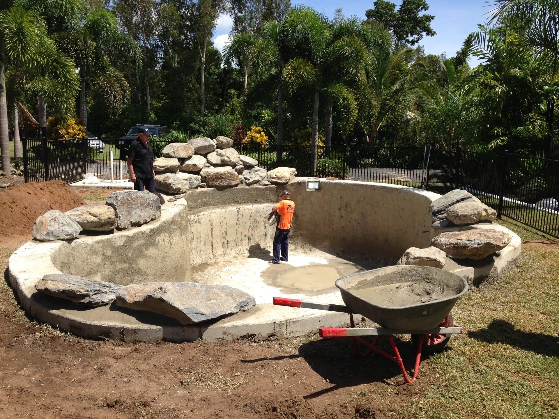 Excavator Clearing Land For Garden At House — Earthworks in Edmonton, QLD