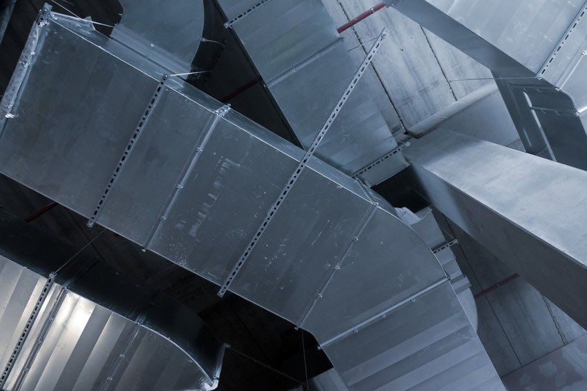 Closeup shot of steel air conditioning duct pipes