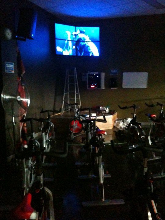 Wall TV And Exercise Bikes — AV Services in Newcastle, NSW