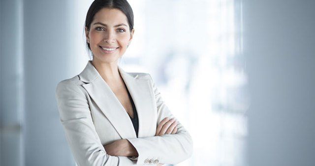Real Estate — Businesswoman Smiling — Dallas, TX